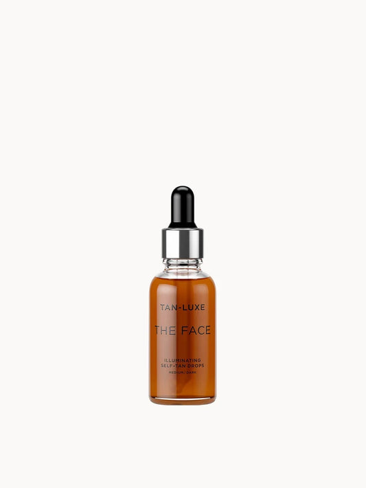 Tan-Luxe The Face Illuminating Self-Tan Drops 30ml Medium Dark clear bottle with dropper and amber liquid inside