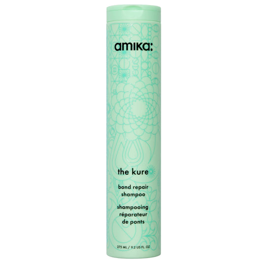Amika The Kure Intense Strength Repair Shampoo 275ml, purple bottle with white star cap