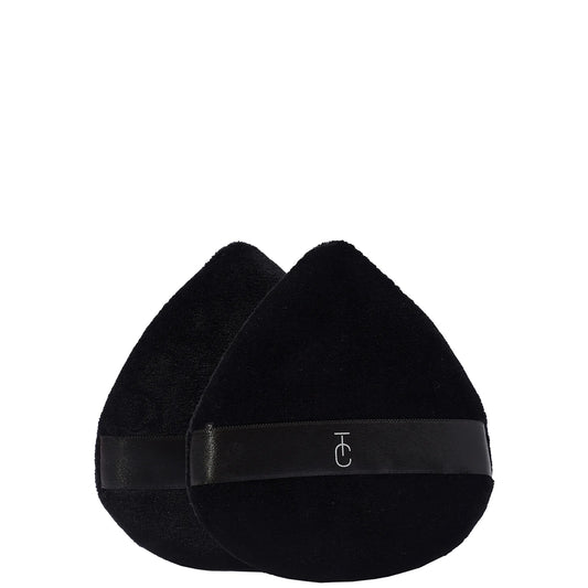 Two Trigwell Cosmetics velvet powder puffs stacked together, soft teardrop-shaped sponges with a fabric band for fingers.