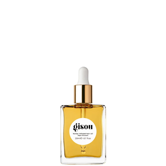 Gisou Honey Infused Hair Oil Mini 20ml, compact clear glass dropper bottle filled with golden oil in travel-size version