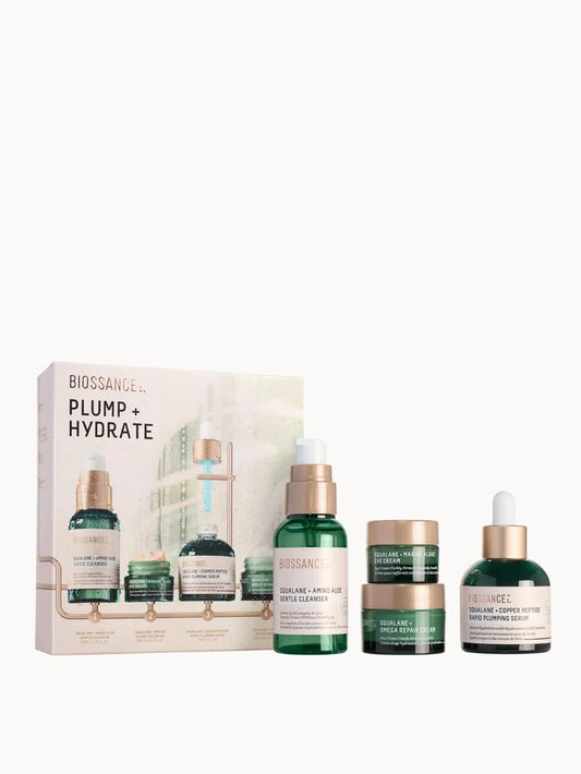 Biossance Plump and Hydrate Set skincare set with multiple Biossance bottles and jars in gift box