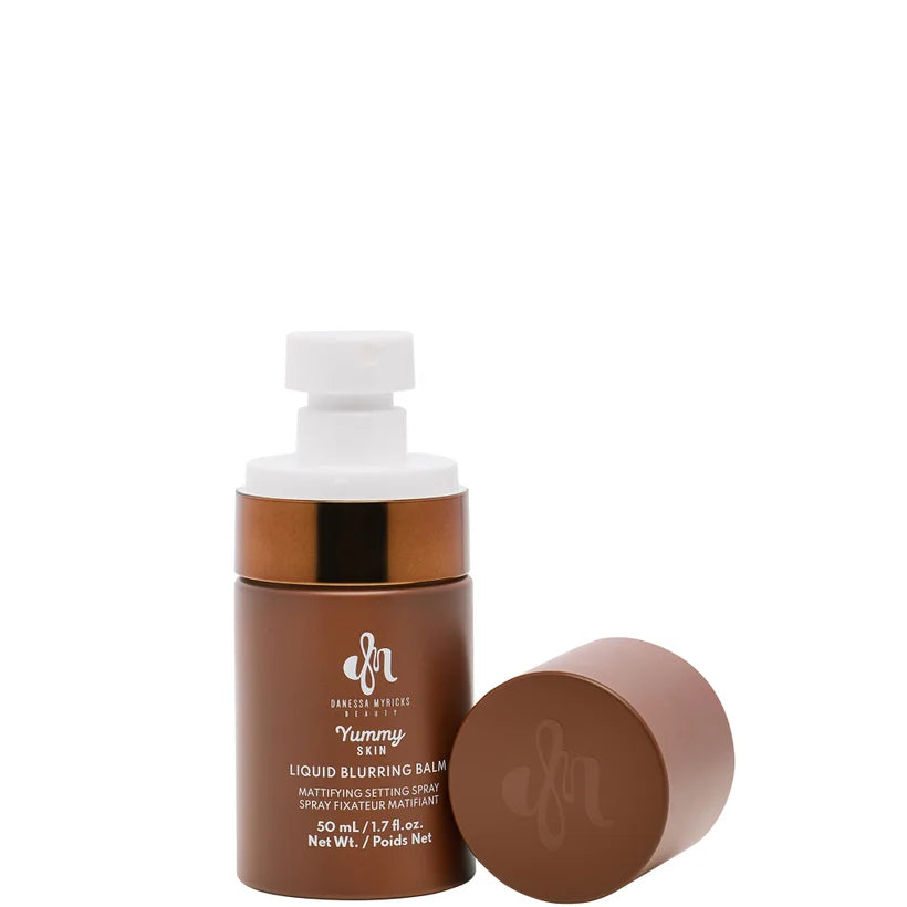 Danessa Myricks Yummy Skin Liquid Blurring Balm Setting Spray 50ml frosted cylindrical spray bottle with minimalist label