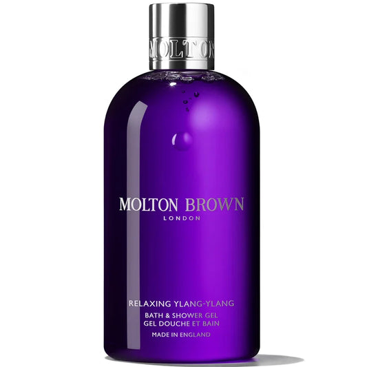 Molton Brown Relaxing Ylang-Ylang Bath and Shower Gel 300ml transparent bottle with yellow liquid and silver cap