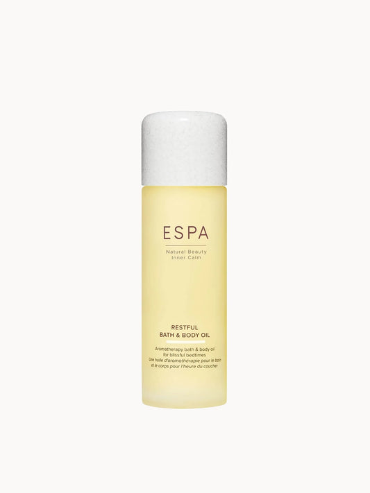 ESPA Restful Bath and Body Oil 100ml, deep blue glass bottle with screw cap and white ESPA lettering