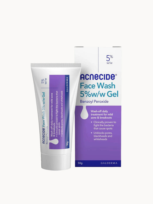 Acnecide Face Wash Spot Treatment 50g, white tube with green cap and blue text