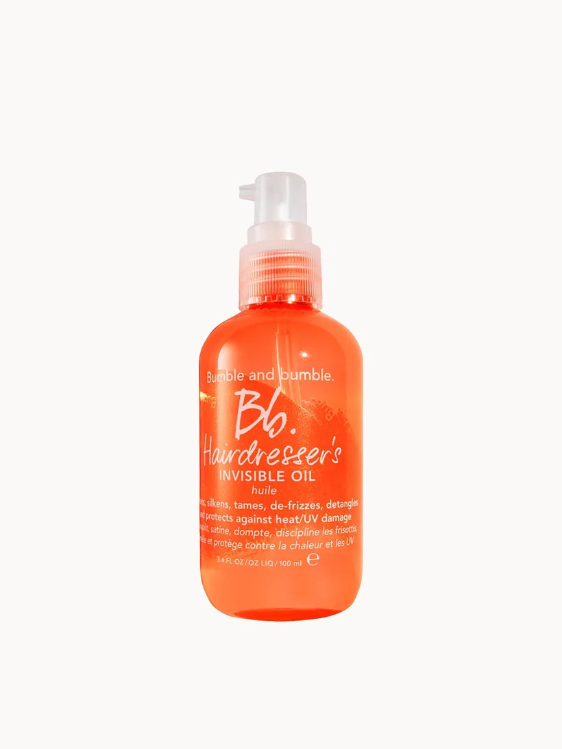 Bumble and bumble Hairdresser's Invisible Oil 100ml clear bottle with yellow oil and white cap