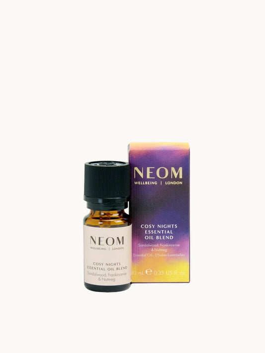 NEOM Cosy Nights Essential Oil Blend 10ml small dark glass bottle with a dropper cap