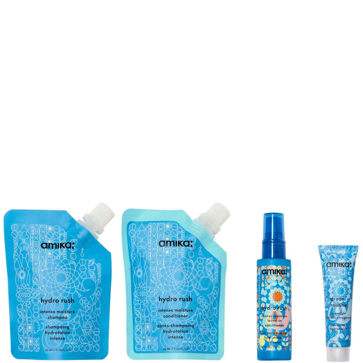 amika Hydro Dream Hydration Routine Trial Set, four pink and orange bottles in travel sizes