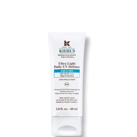 Kiehl's Ultra Light Daily UV Defense Aqua Gel SPF 50 PA++++ 60ml sunscreen in white Kiehl’s tube with yellow accents shown on a yellow background