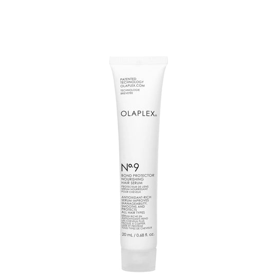 Mini Olaplex No. 9 Bond Protector hair serum, small travel-size tube with white packaging and orange number 9 on the front.