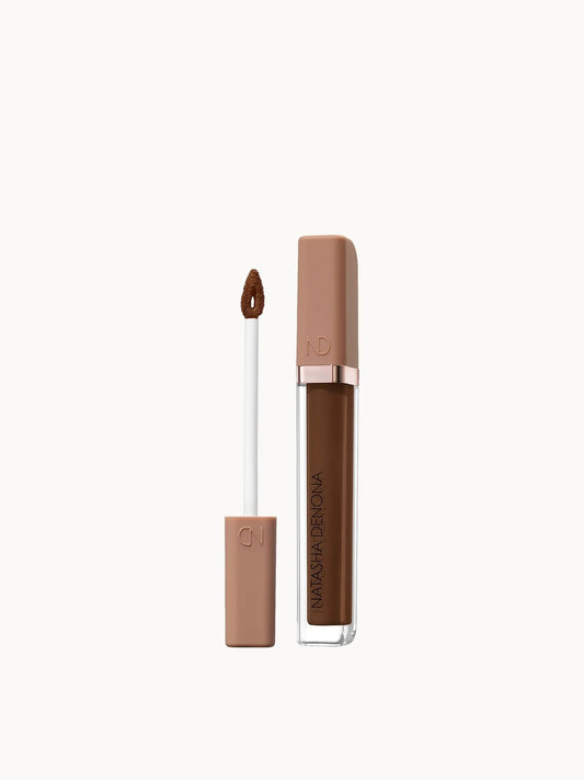 Natasha Denona Hy - Glam Concealer - NR15, slim concealer bottle with black cap and flocked doe-foot applicator