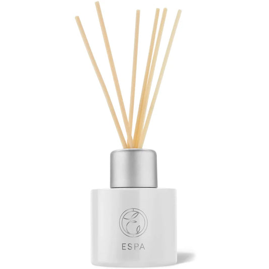 ESPA Restorative Diffuser 200ml glass bottle with natural rattan reed sticks fanned out at the top