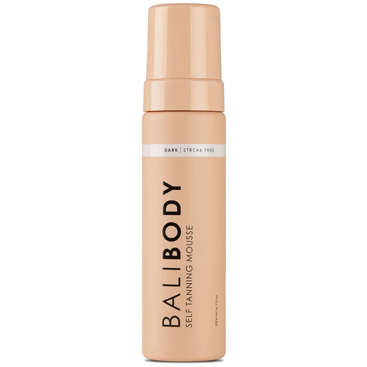 Bottle of Bali Body Self Tanning Mousse in medium tone with sun-kissed bronze glow