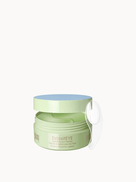 Pixi Detoxifeye Eye Patches Serum, clear jar with 30 pairs of gold-flecked hydrogel patches