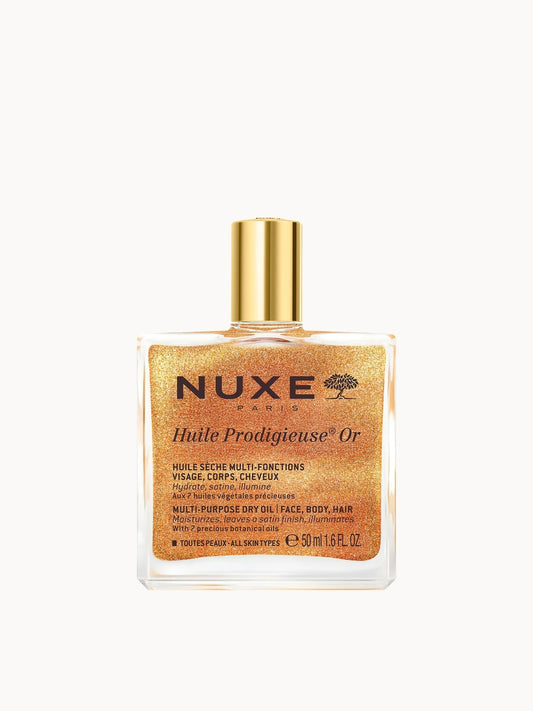 NUXE Huile Prodigieuse Shimmering Multi - Purpose Dry Oil 50ml, glass spray bottle of golden shimmering oil with gold-tone cap