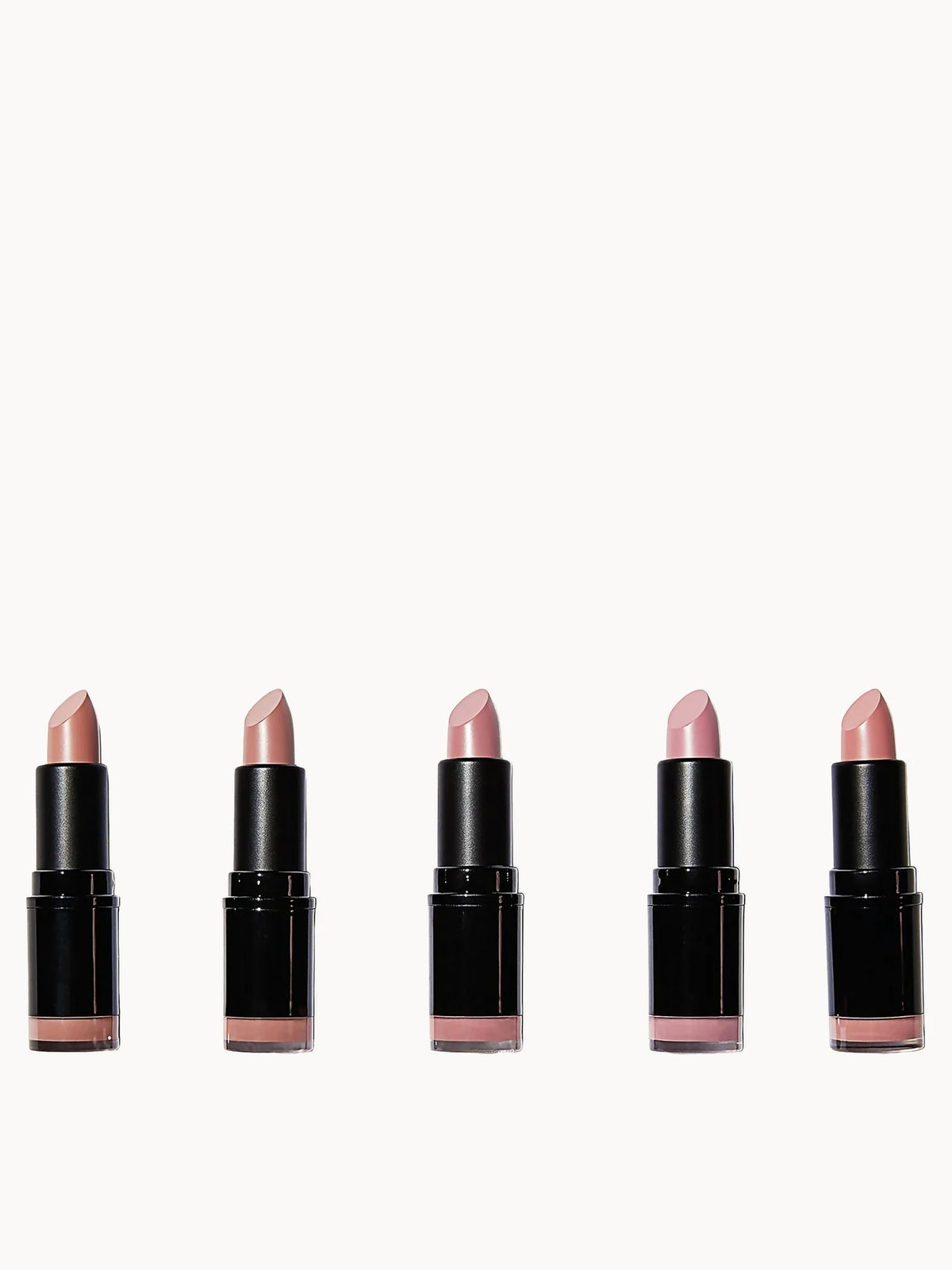 Revolution Lipstick Collection - Matte Nude, black bullet-shaped lipstick case with pink Revolution logo cap