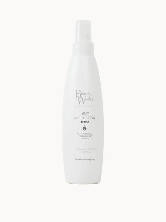 Beauty Works Heat Protection Spray 250ml, clear spray bottle with black cap and Beauty Works branding